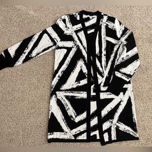 Chico’s open cardigan black and white. NWT size small or zero. Mid thigh length